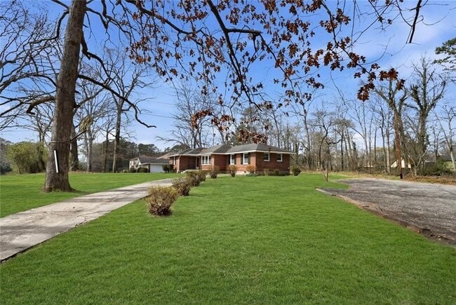 5205-5205 Five Forks Trickum Rd SW in Lilburn, GA - Building Photo - Building Photo