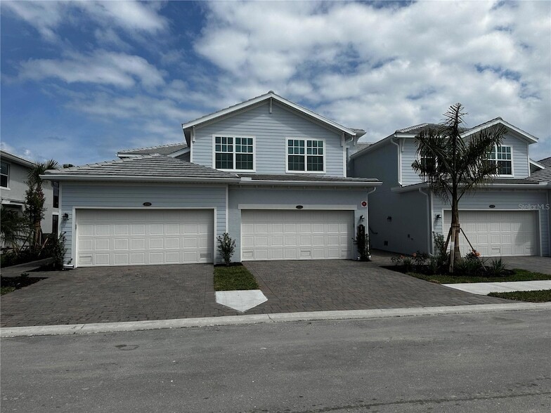 14174 Poppy Fld Lp, Unit 16 in Punta Gorda, FL - Foto de edificio