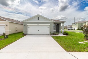 3302 Pine Lily Ave in Poinciana, FL - Building Photo