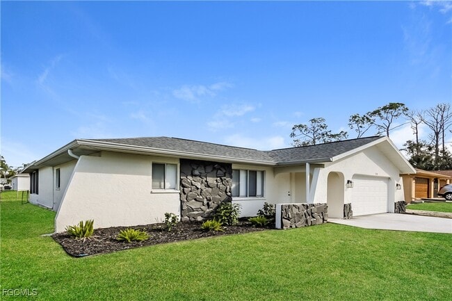 1318 Arrow St in Port Charlotte, FL - Building Photo - Building Photo