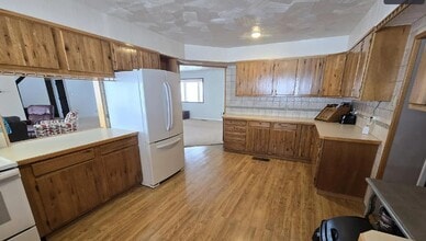 24 Spring St. Unit A in Phoenix, NY - Building Photo - Building Photo