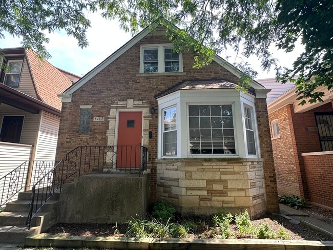property at 5137 N Lowell Ave