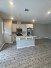 1449 Axel Graeson Ave in Kissimmee, FL - Building Photo - Building Photo