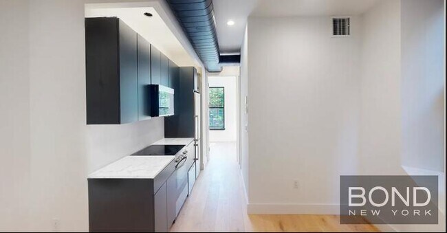 77 E 3rd St in New York, NY - Building Photo - Building Photo