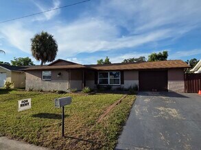 7144 Stone Rd in Port Richey, FL - Building Photo - Building Photo
