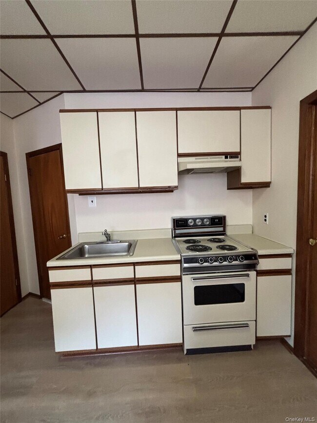 property at 55-12 Van Cleef St