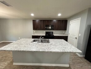 7329 Port Pl St in Southport, FL - Building Photo - Building Photo
