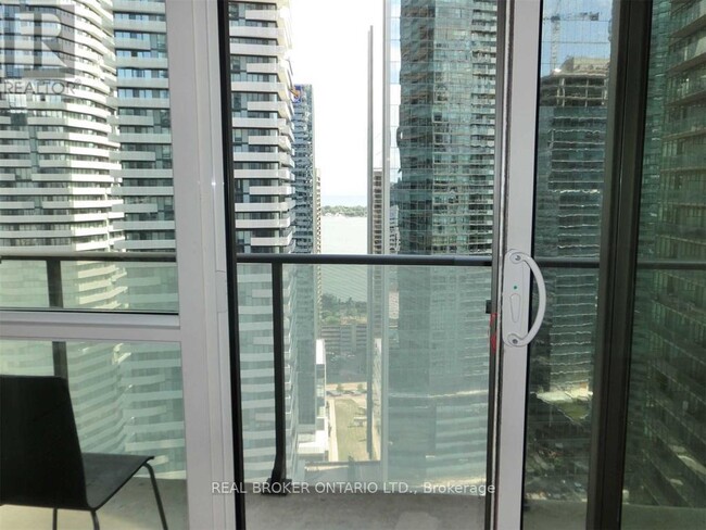 65-3065 Bremner Blvd in Toronto, ON - Building Photo - Building Photo