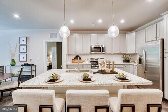 21731 Dovekie Ter, Unit Unit 403 in Ashburn, VA - Building Photo - Building Photo