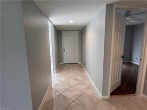 1406 Churchill Cir-Unit -P-102 in Naples, FL - Building Photo - Building Photo