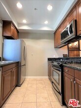 1401 S St Andrews Pl-Unit -407 in Los Angeles, CA - Building Photo - Building Photo