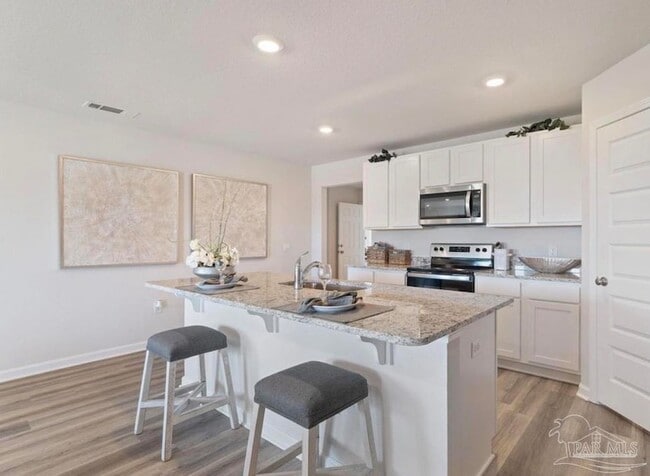 5856 Belmont Stakes Rd in Bellview, FL - Building Photo - Building Photo