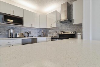 313 Knotty Pine Cir, Unit A-2 in Greenacres, FL - Foto de edificio - Building Photo