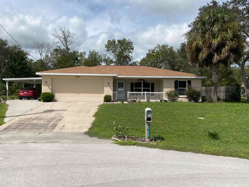 6014 N Buckland Dr in Citrus Springs, FL - Foto de edificio