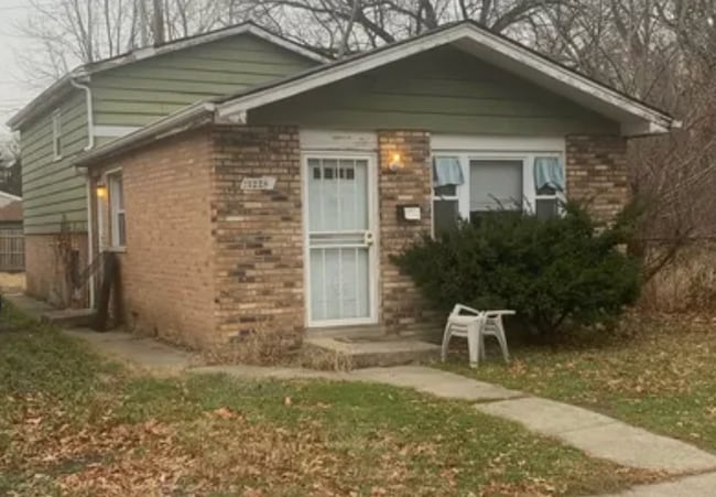 property at 1228 W 109th St