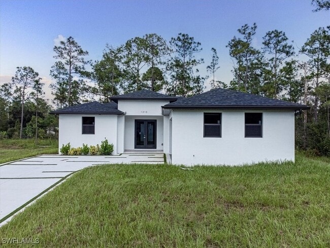 1006 Hamilton Ave in Lehigh Acres, FL - Building Photo - Building Photo