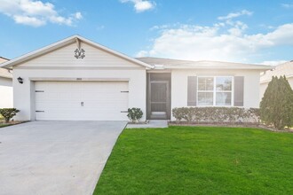 1803 Rain Lily Pl in St. Cloud, FL - Foto de edificio - Building Photo