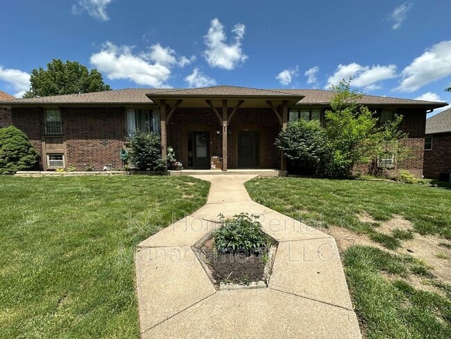 property at 209 NW Highland Ln