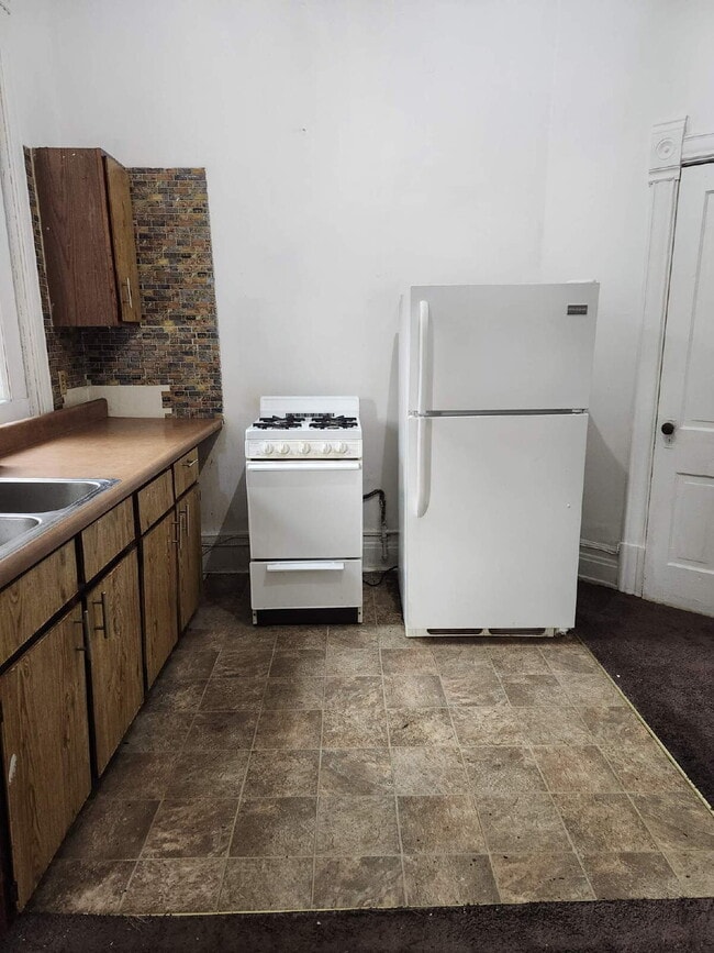 property at 113 E 3rd St