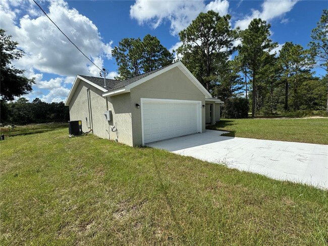 12 Malauka Cir in Ocklawaha, FL - Building Photo - Building Photo