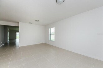1455 Swan Lake Cir in Dundee, FL - Building Photo - Building Photo