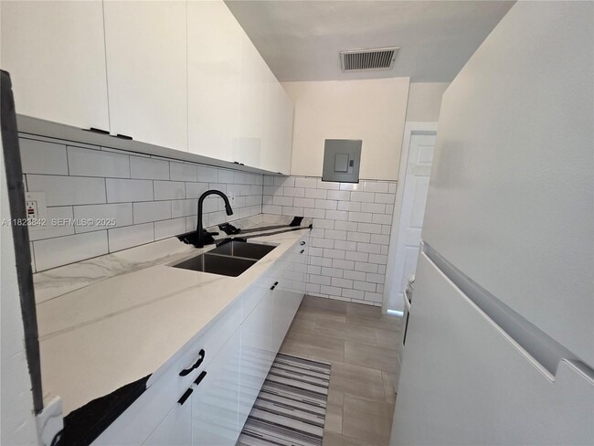 property at 120 NE 10th Ave