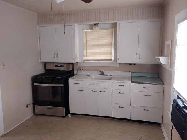 property at 3211 Maple Ave