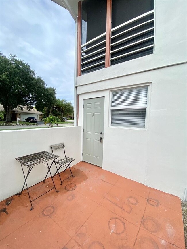 3200 Coral Springs Dr, Unit 110 in Coral Springs, FL - Building Photo - Building Photo