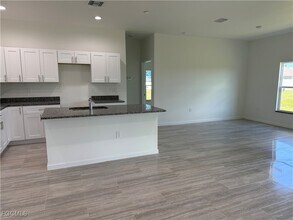 1027 Eisenhower Blvd in Lehigh Acres, FL - Building Photo - Building Photo