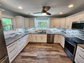 110 Surf St in New Smyrna Beach, FL - Foto de edificio - Building Photo