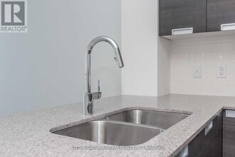 5025 Four Springs Ave in Mississauga, ON - Building Photo - Building Photo