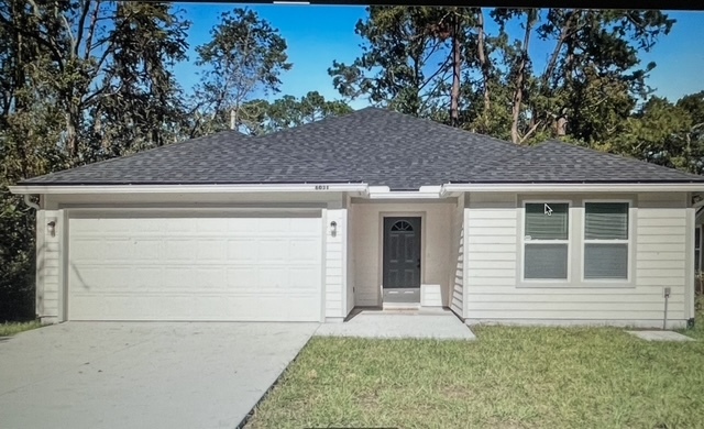 6031 Moncrief Rd W in Jacksonville, FL - Building Photo