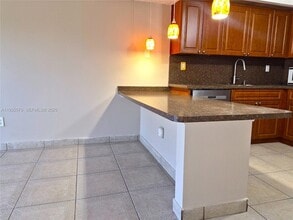 8811 SW 132nd Pl, Unit 203CW in Miami, FL - Foto de edificio - Building Photo