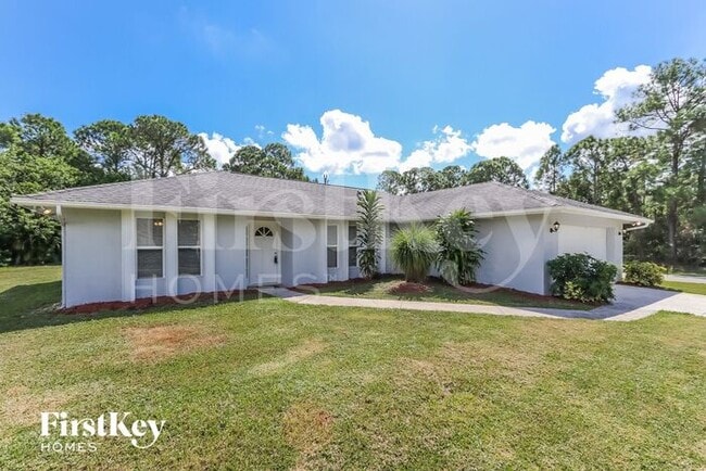 3265 SW Escarole St in Port St. Lucie, FL - Building Photo - Building Photo