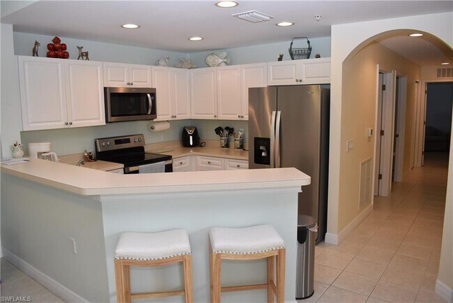 3940 Pomodoro Cir-Unit -302 in Cape Coral, FL - Foto de edificio - Building Photo