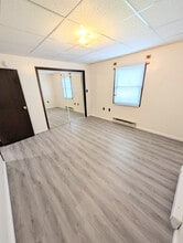 225 E Orvis St, Unit Apt 1 in Massena, NY - Building Photo - Building Photo