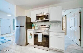 2621 Lagoon Knoll Dr in Panama City, FL - Building Photo - Building Photo