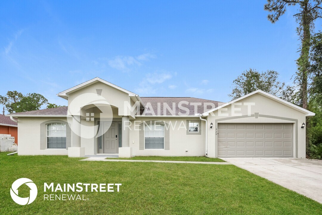 329 Lubdel Ave S in Lehigh Acres, FL - Foto de edificio