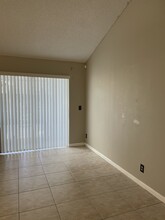 4383 Woodstock Dr, Unit D in West Palm Beach, FL - Building Photo - Building Photo
