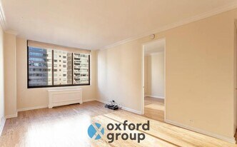 200-210-210 E 65th St in New York, NY - Building Photo