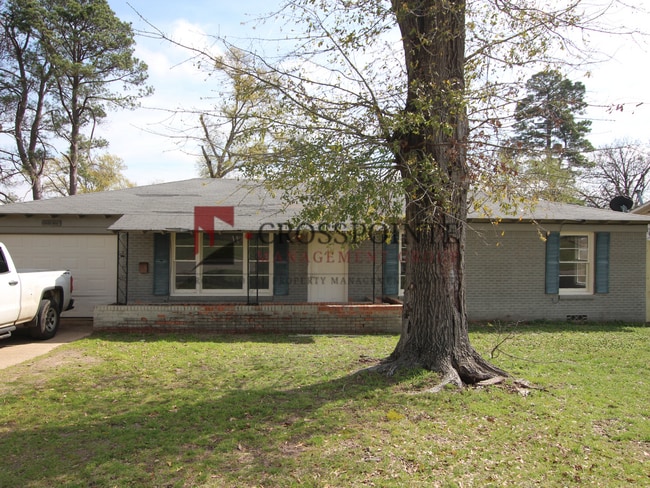 property at 1712 Redbud Ave