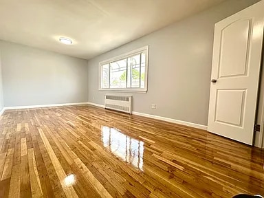 property at 66-28 Wetherole St
