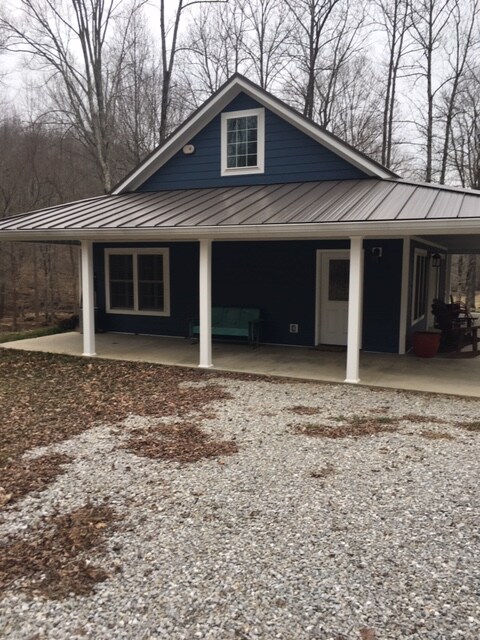 1341 Old Bear Creek Rd in Vanleer, TN - Building Photo