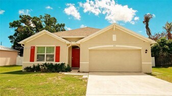 2402 SE Gillette Ave in Port St. Lucie, FL - Building Photo