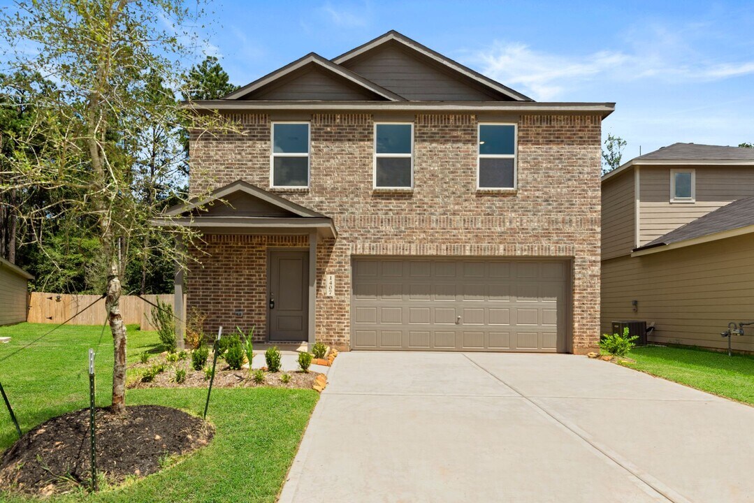 1407 Cedar Plns Ct in Conroe, TX - Foto de edificio