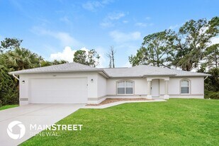 1581 S Chamberlain Blvd in North Port, FL - Building Photo