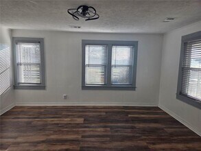 5465 Jot Em Down Rd in Cumming, GA - Building Photo - Building Photo