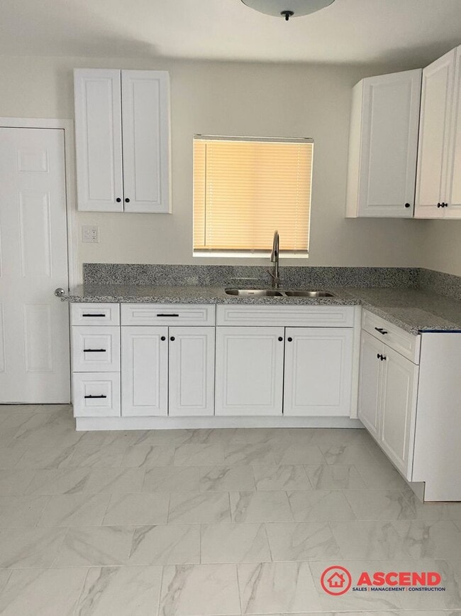 property at 1102 E 18th St