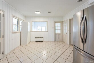 1 Sutton Pl in Lawrence, NY - Building Photo - Building Photo