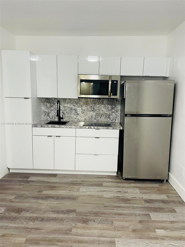 property at 16050 NE 3rd Ave